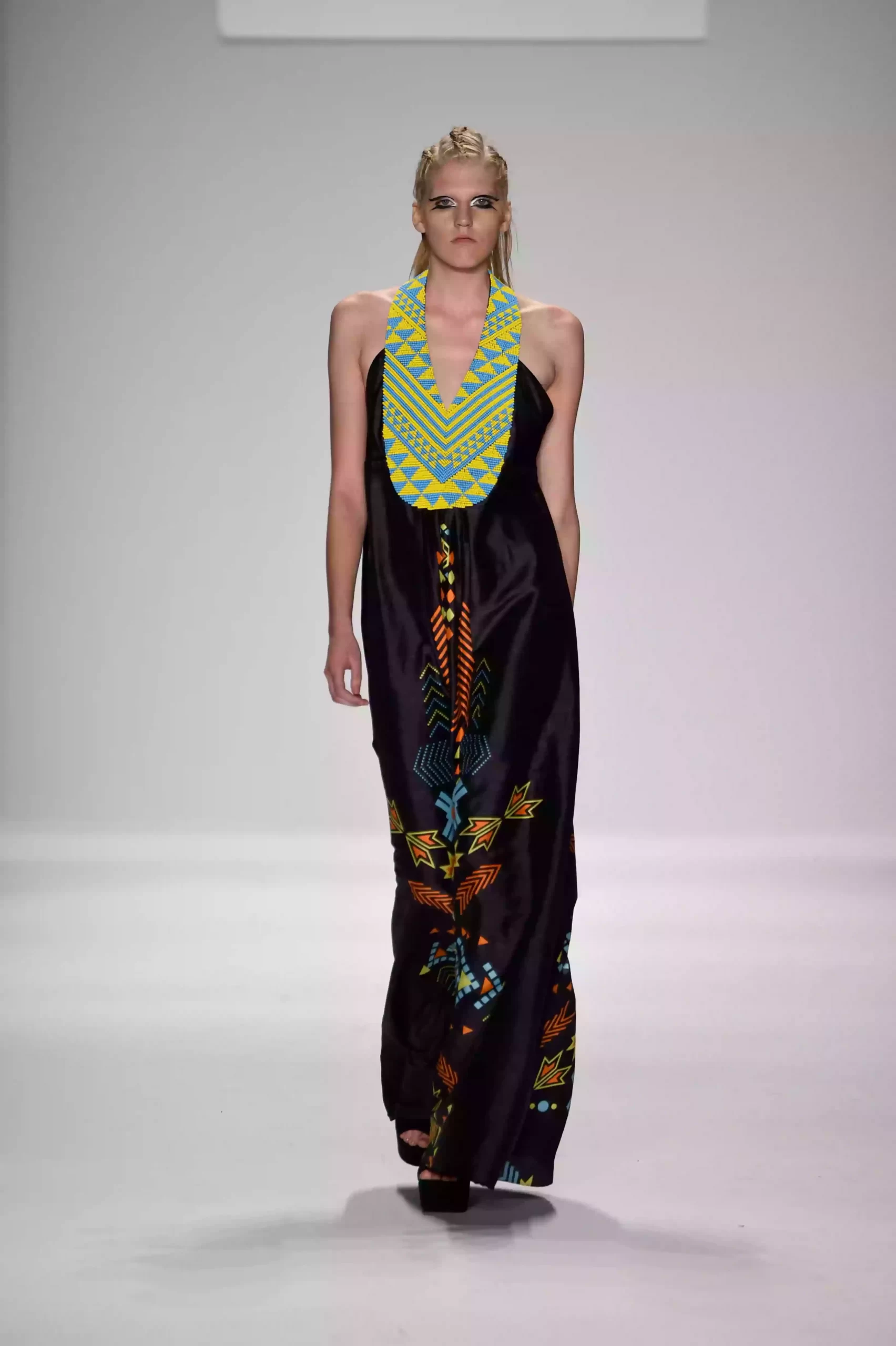طبعات حيوانات وتصاميم قبلية حصرية: إبداع في أسبوع الموضة بنيويورك – ربيع/صيف 2015 11 Kaftan dress with a deep neckline, hand-beaded details, and tribal print.